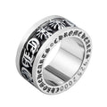 chrome hearts black and gold rotating letter cross flower ring