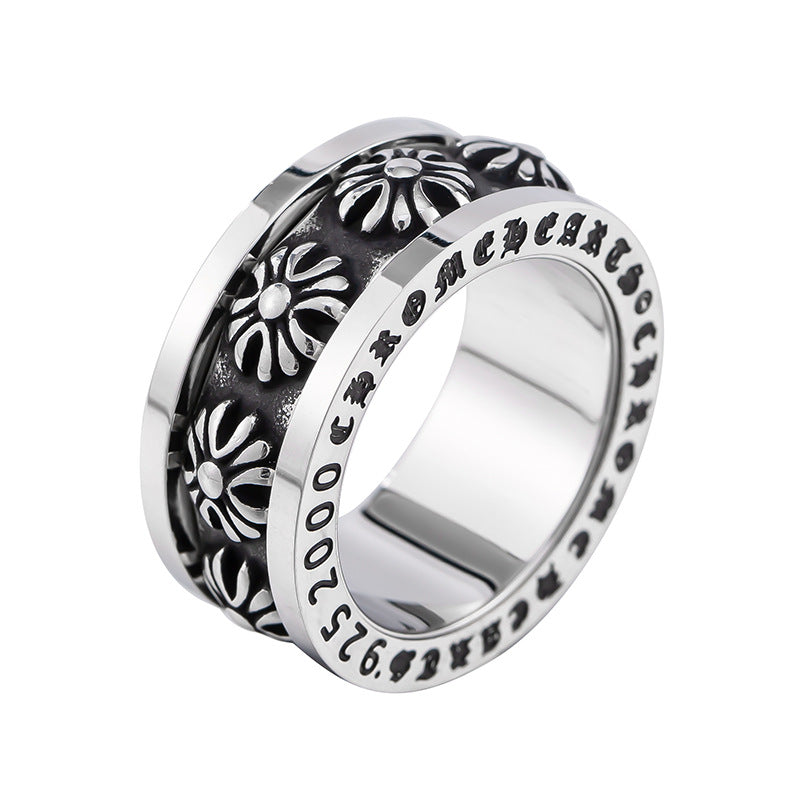 chrome hearts black and gold rotating letter cross flower ring